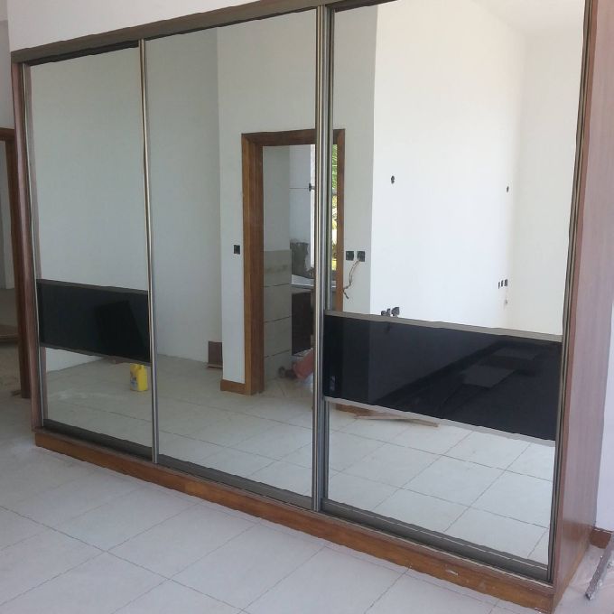 New House Sliding Door Glass Wardrobe Installation in Kitengela