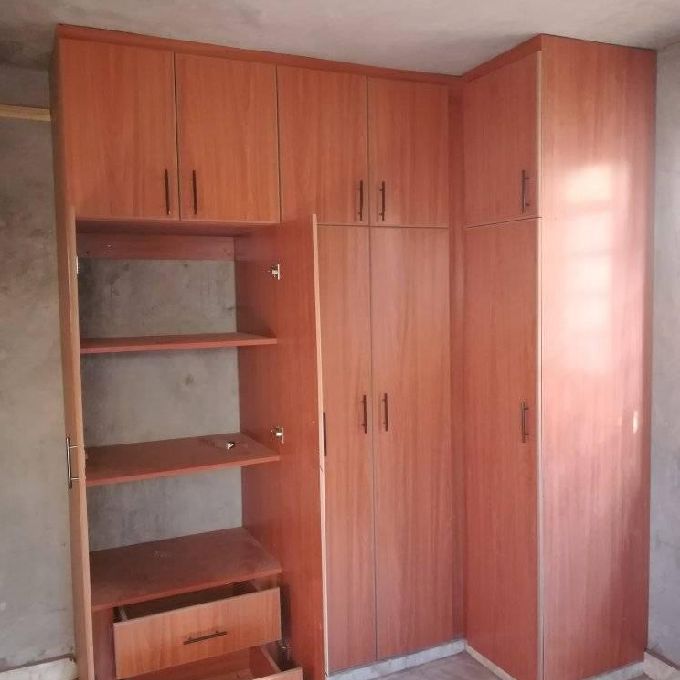 Designing & Installation of a Light Cherry Wardrobe for a Client in Kikuyu