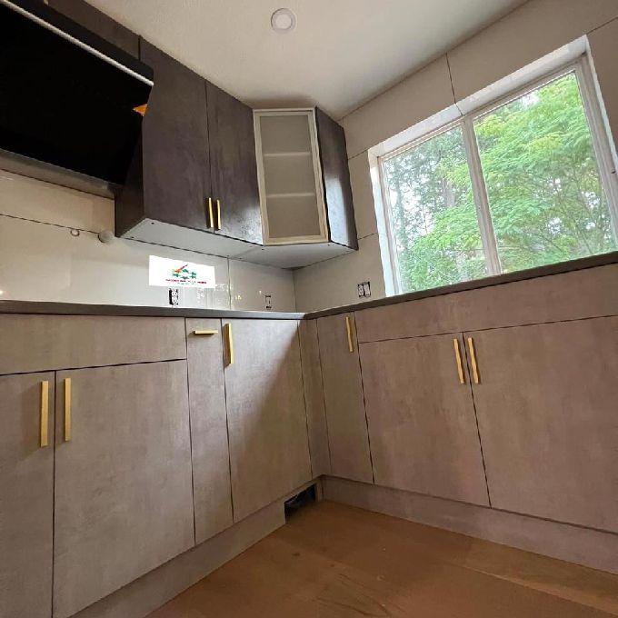 American Walnut MDF Board Kitchen Cabinets Installed in Runda