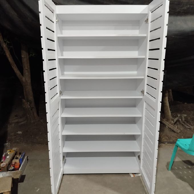Designing & Supply of a White Shoe Rack Cabinet to a Client in Utawala
