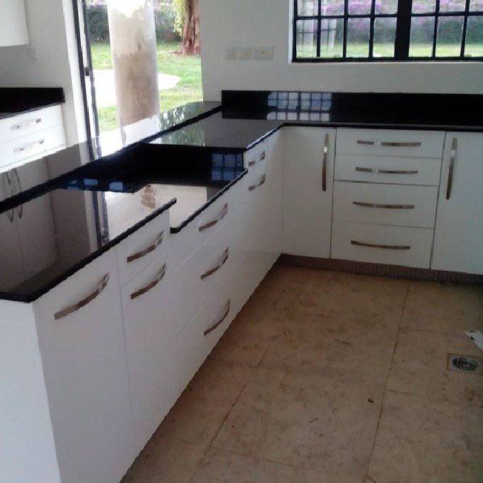 Installation of White Laminated MDF Kitchen Cabinets in Malindi