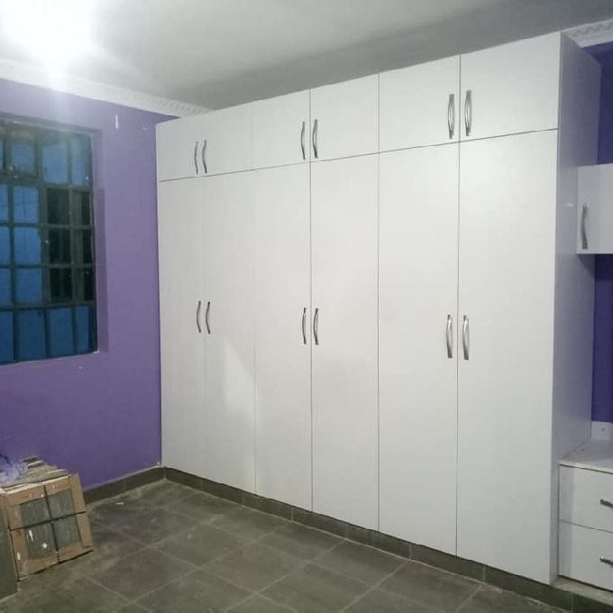Installation of White Laminated Wooden MDF Wardrobe in Changamwe