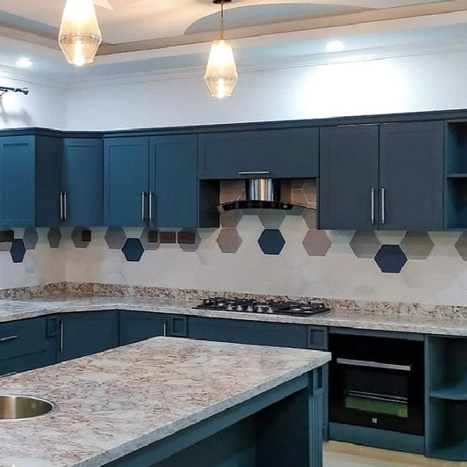 Installation of Engraved MDF Kitchen Cabinets in Bombolulu
