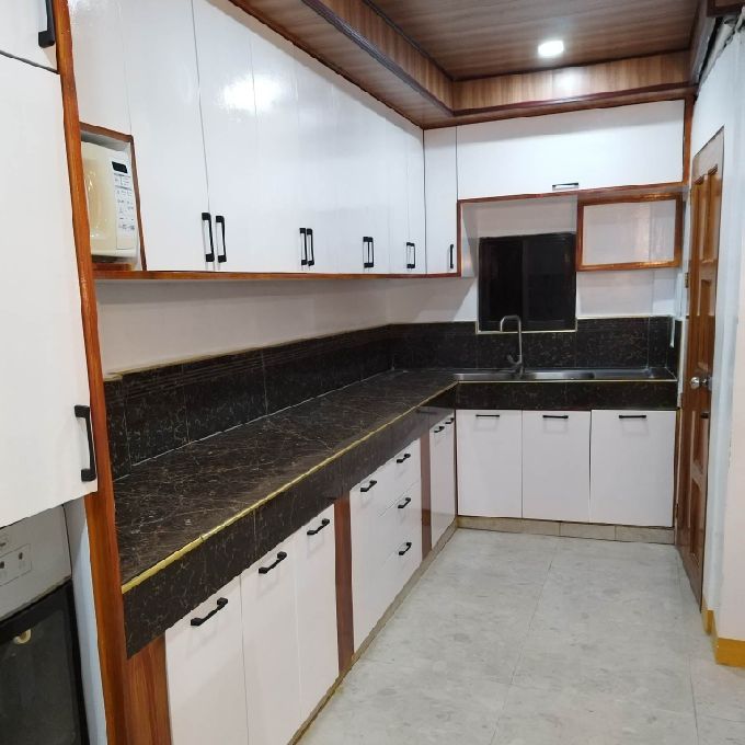 L-Shaped MDF Kitchen Cabinet Installation Project in Mariakani