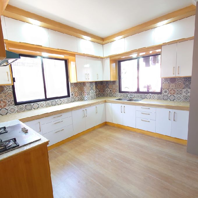 U-Shaped Lamintated MDF Kitchen Cabinets Installation in Mpeketoni