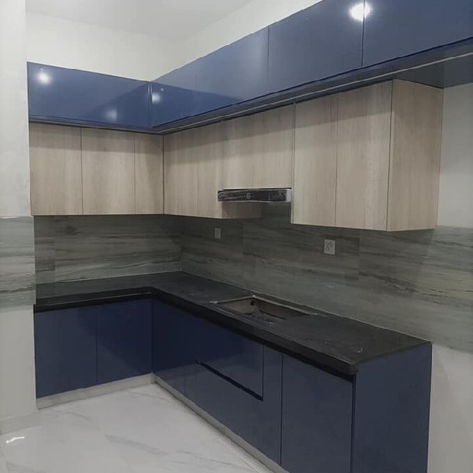 Laminated Blue & Beech Kitchen Cabinet Fitting Contract in Loresho