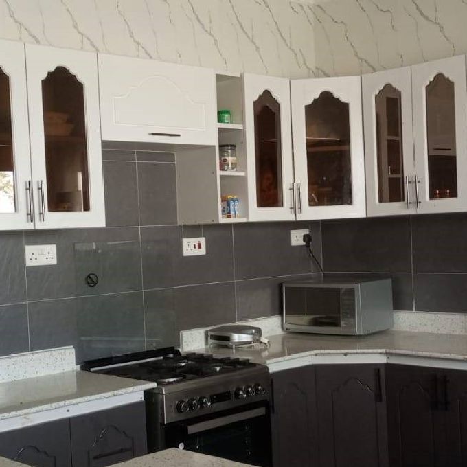 Engraved Two-Toned MDF Kitchen Cabinets Installation in Kiriaini