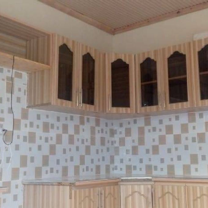 Engraved & Laminated MDF Kitchen Cabinets Fitting in Kangari 