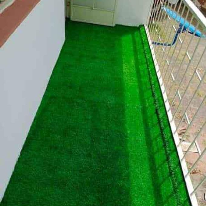 Installing Artificial Green Grass Carpet in a Balcony in Roysambu