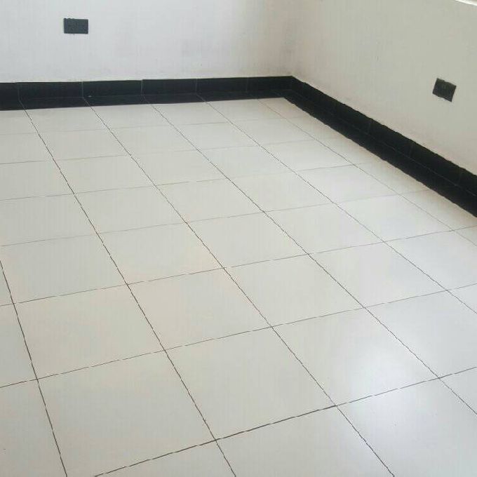 Installation of Floor Tiles for a New Home in Kirinyaga 