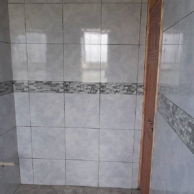 Installation of Bathroom Floor & Wall Tiles in Kitengela