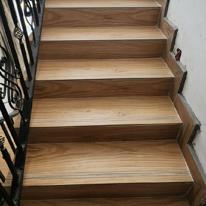 Installation of Staircase Porcelain Woodprints Tiles in Lanet